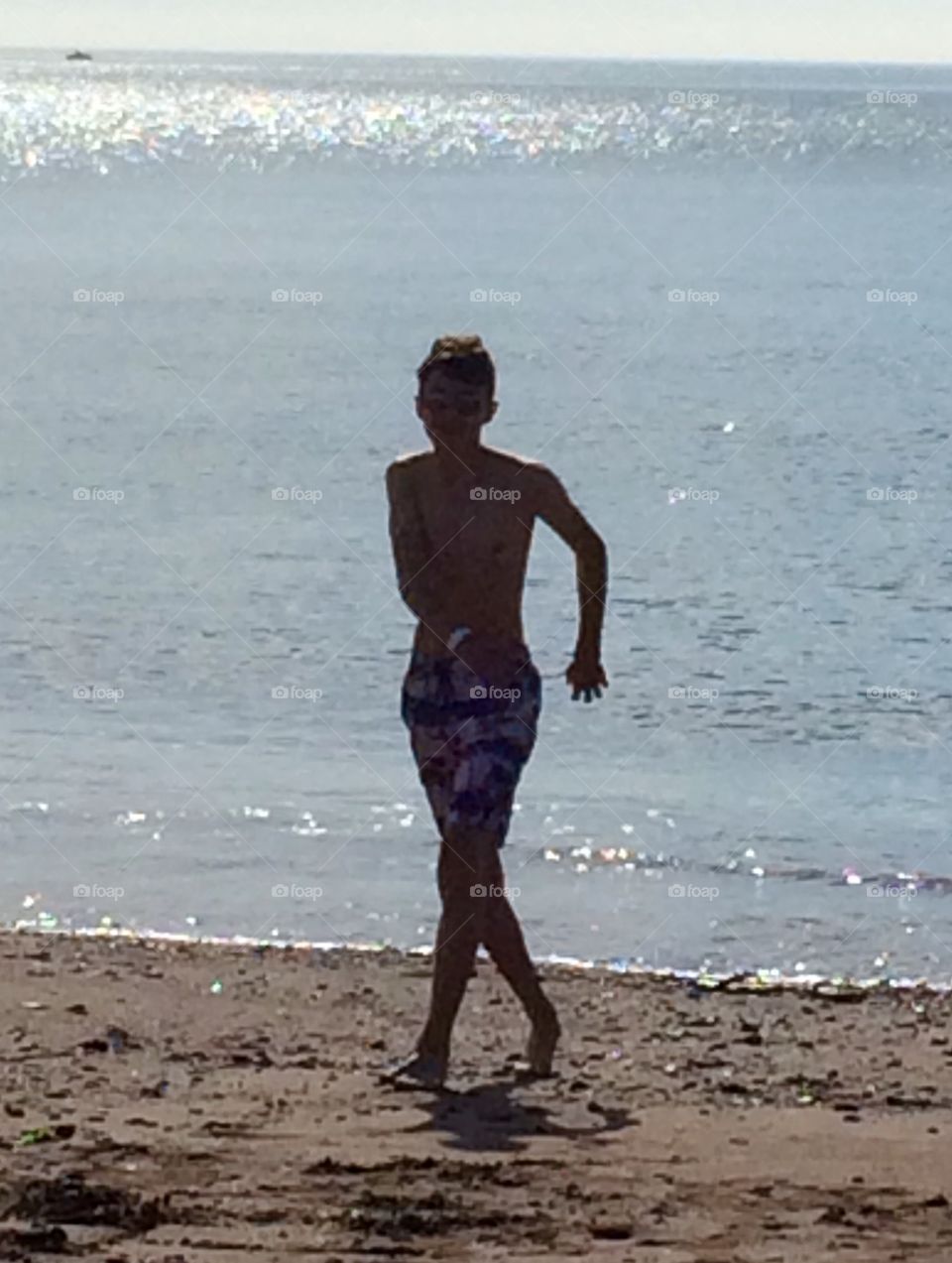 Ooooh its a bit cold in that sea! Get me out of there quickly. A Devon beach one summer morning. 