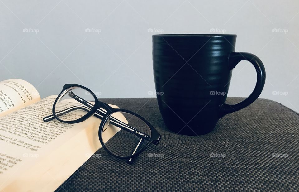 Reading and relaxing with a cup of tea