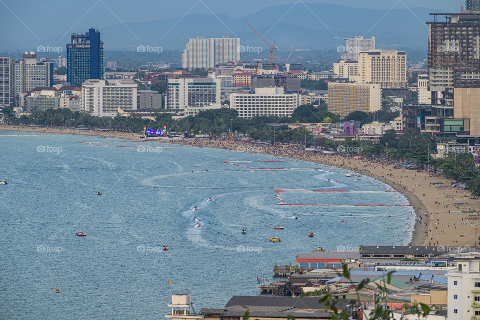 Skyscraper and Boats in Phattaya bay Thailand