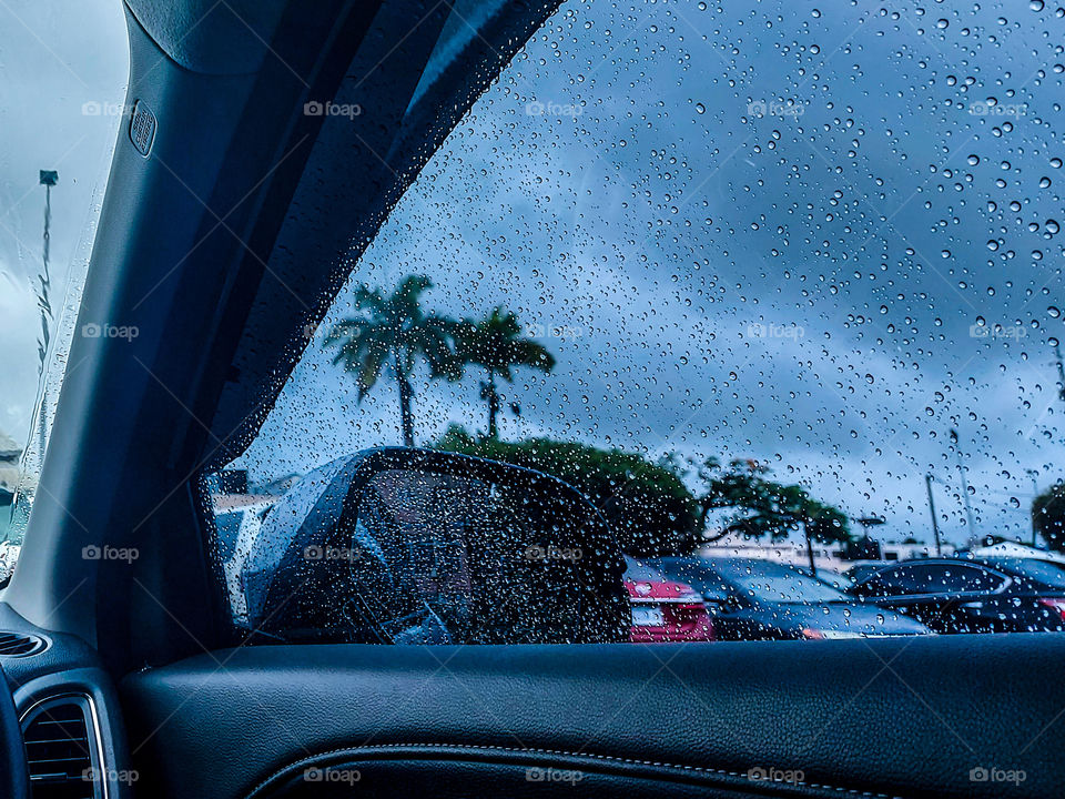 Stuck in my car on a rainy day