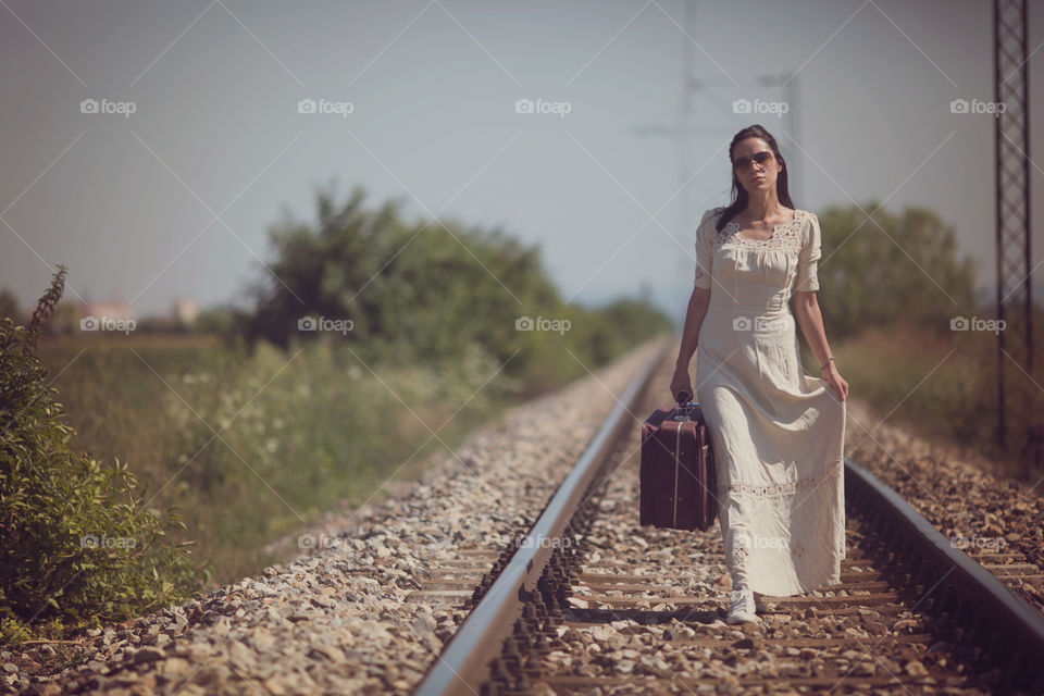 Woman at rail track
