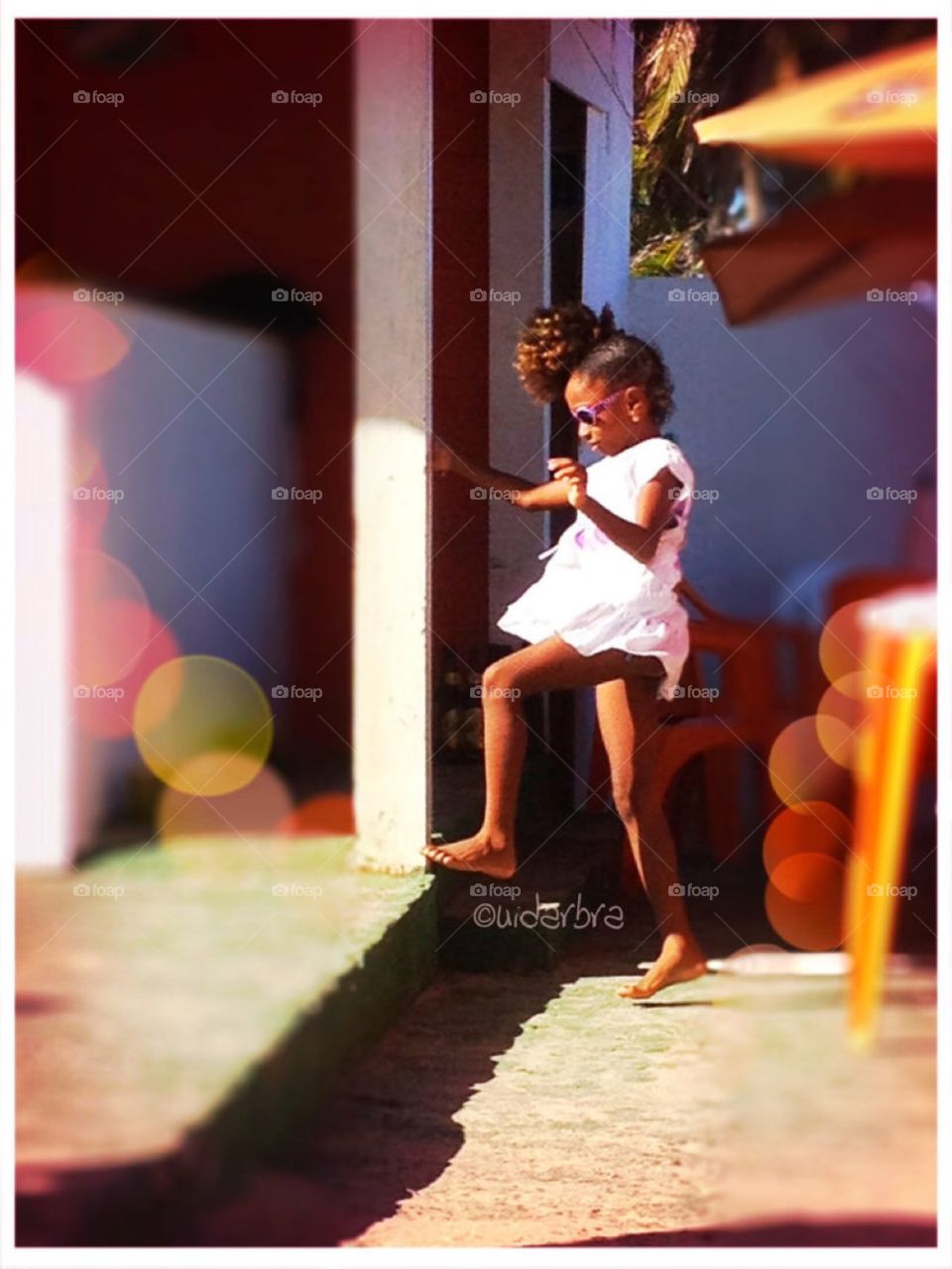 Little girl. Just a little girl playing at the beach