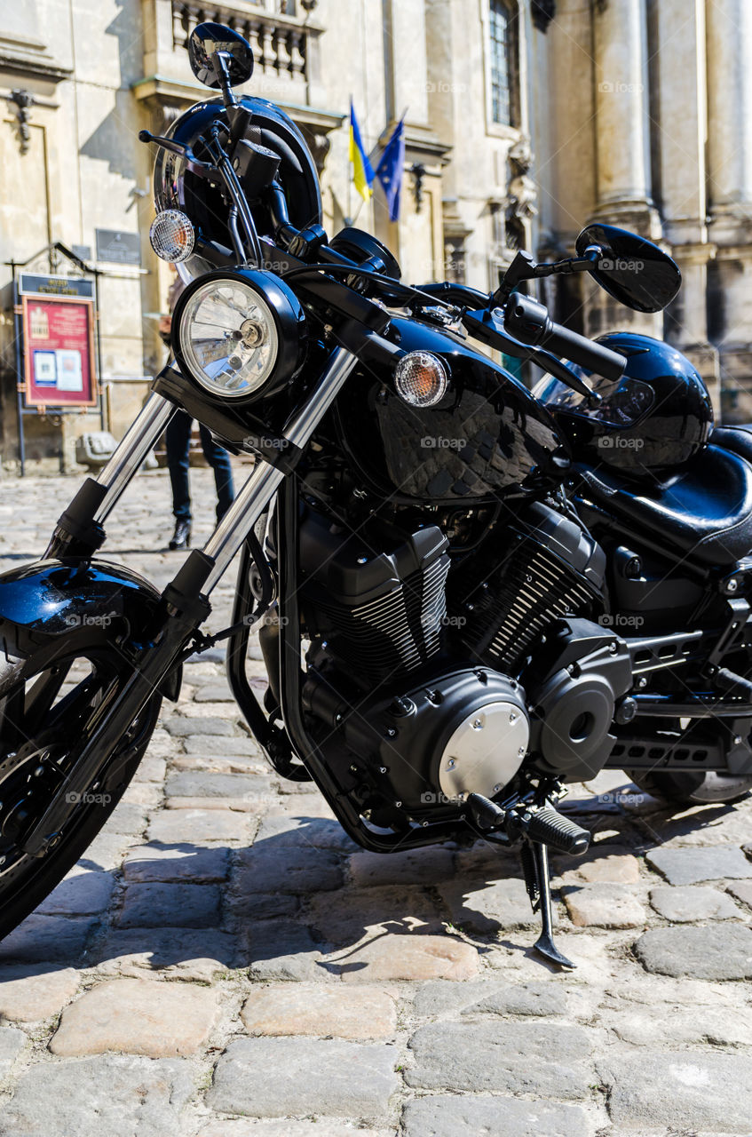 Black classic motorcycle on the street