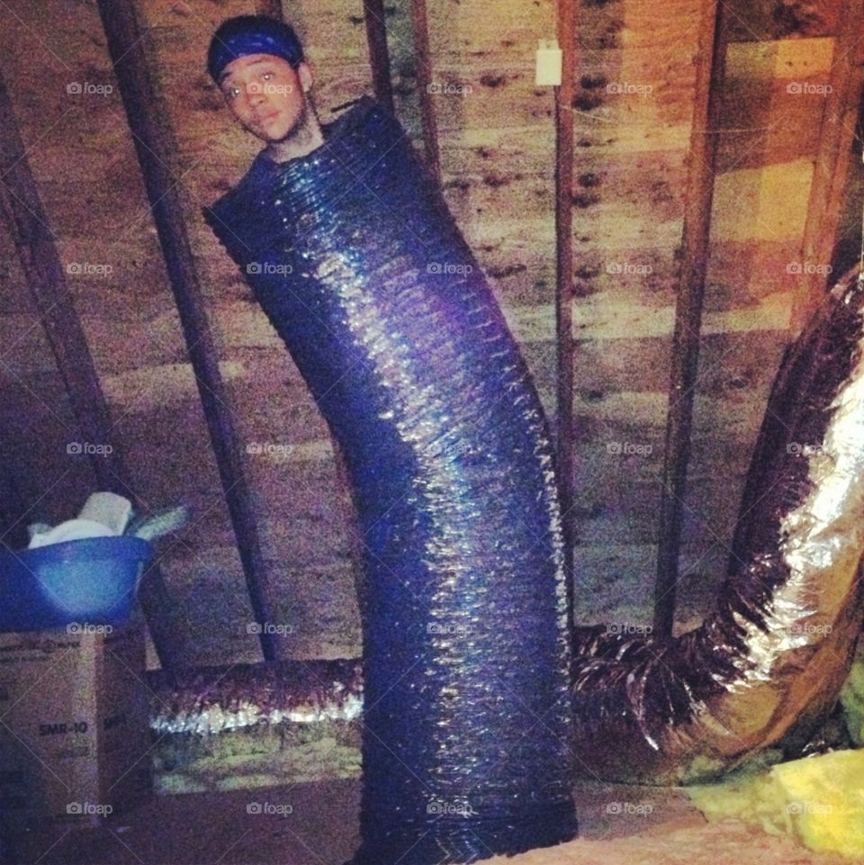 Stuck in a rut. HVAC worker stuck in a rut