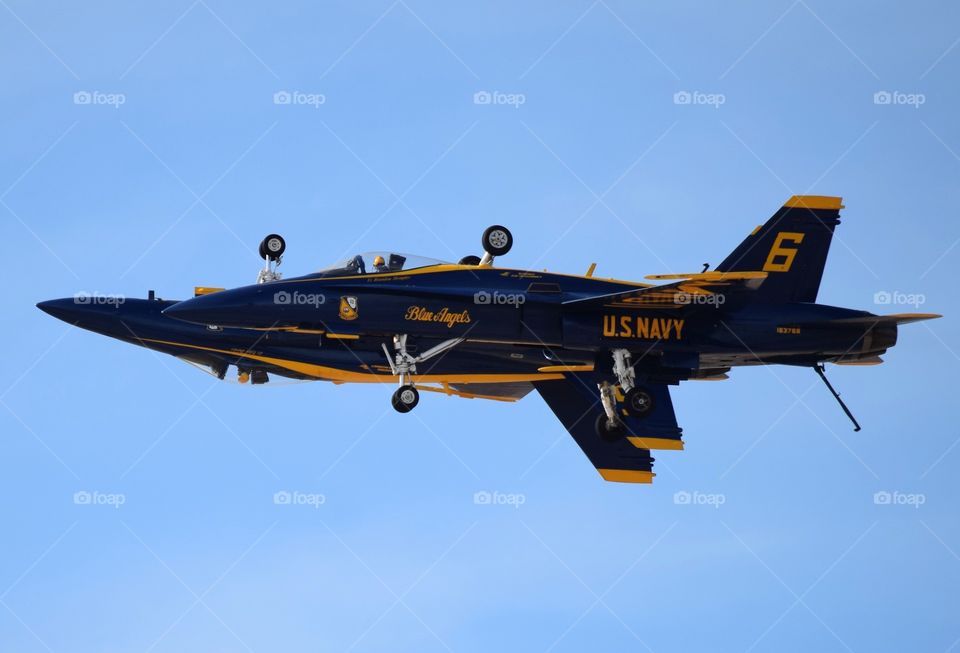 US Navy Blue Angels flight demonstration team solos fly within inches of each other with one inverted