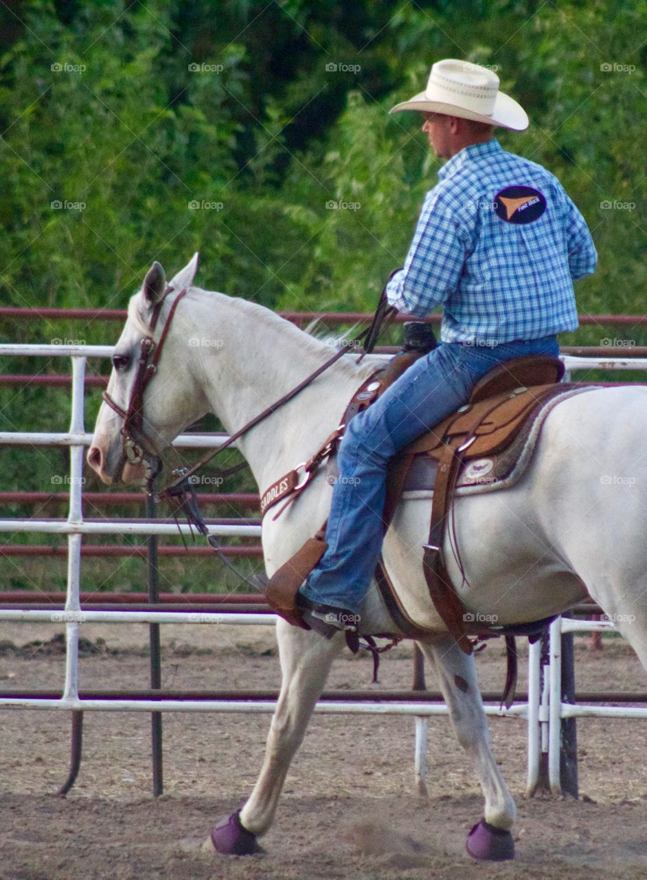 A rodeo rider warms up before the big event