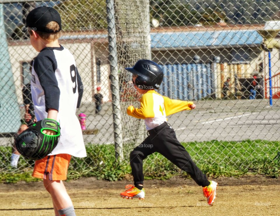 Love Running. Young Baseball Runner
