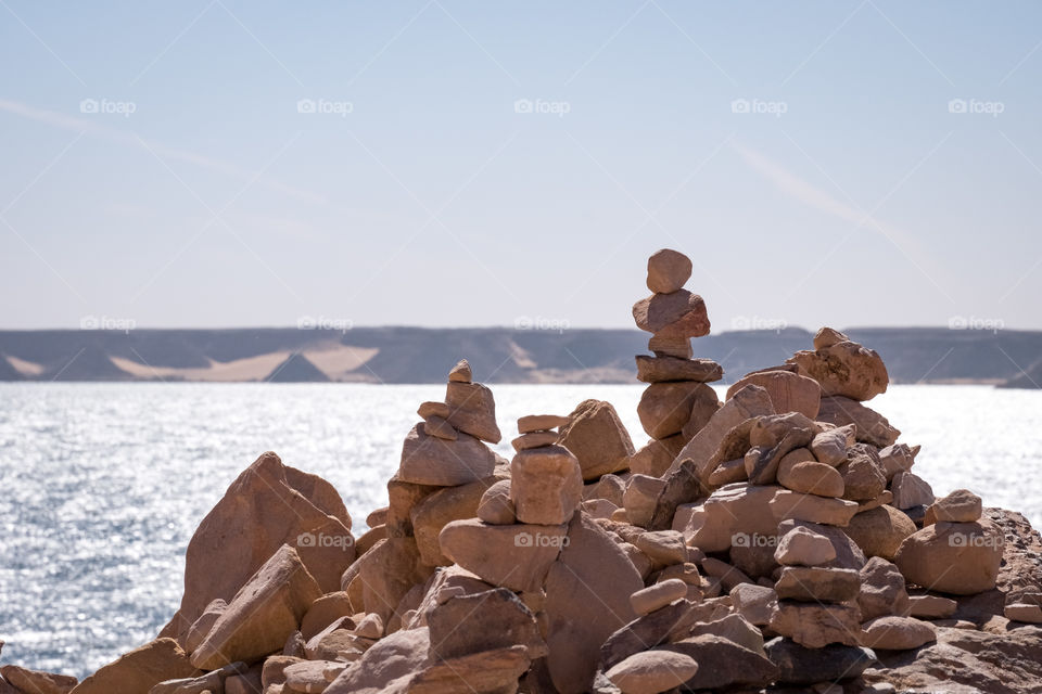 Stacking stone on river background to show balance