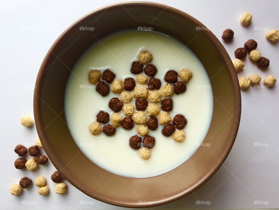 dry breakfast in form of ball in the milk