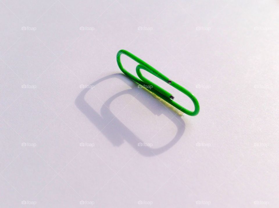 Green office paper clip 