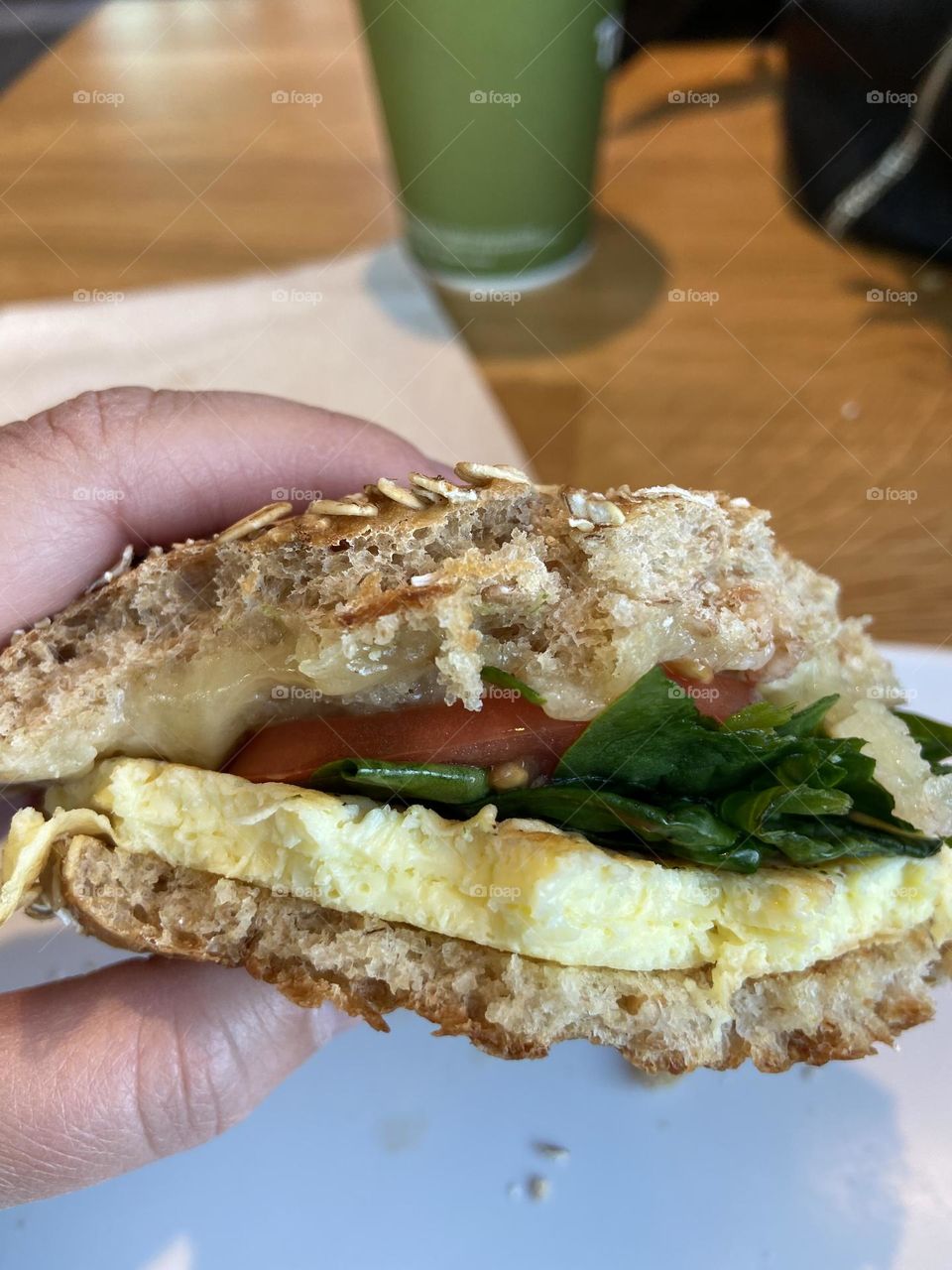 A breakfast sandwich with scrambled egg, white cheddar cheese, spinach and tomato from Panera Bread. This is a sandwich I customized, but they many options on the menu for a healthy start in the morning. I also had a cup of orange ginger mint tea.