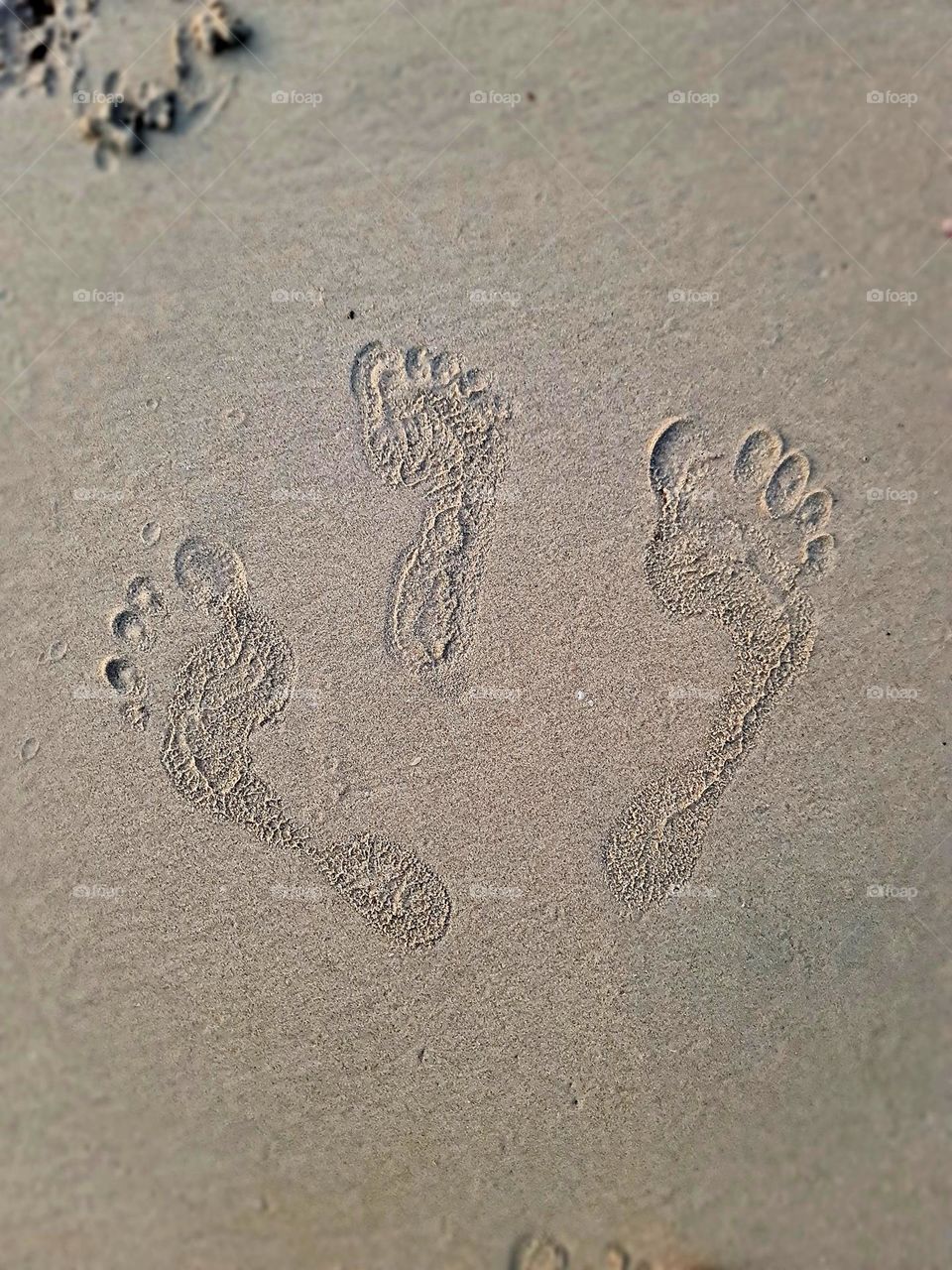 Dad, why you had 2 footprints in the sand?