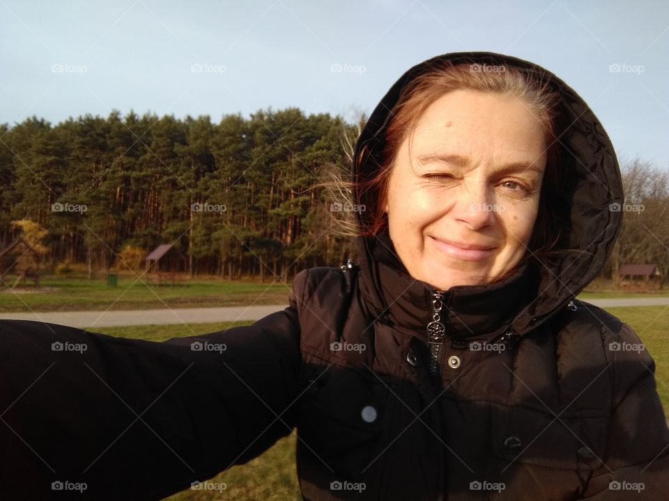 selfie girl on the nature in the solar light