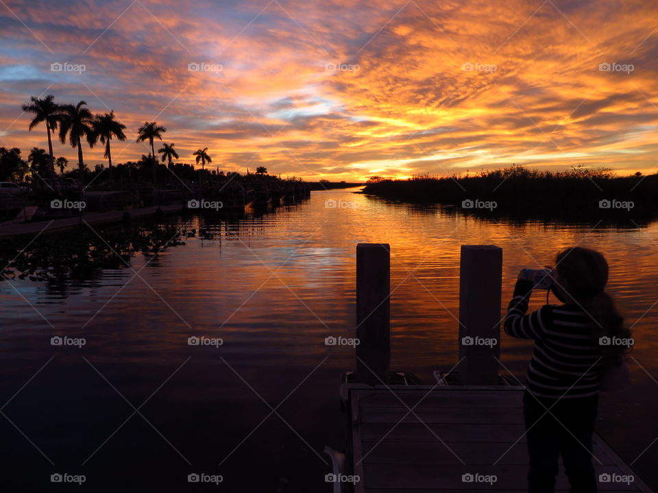 Girl enjoying amazing sunset