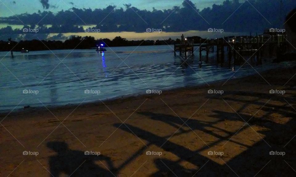 anticipation. shadows of kids waiting for firework show to start