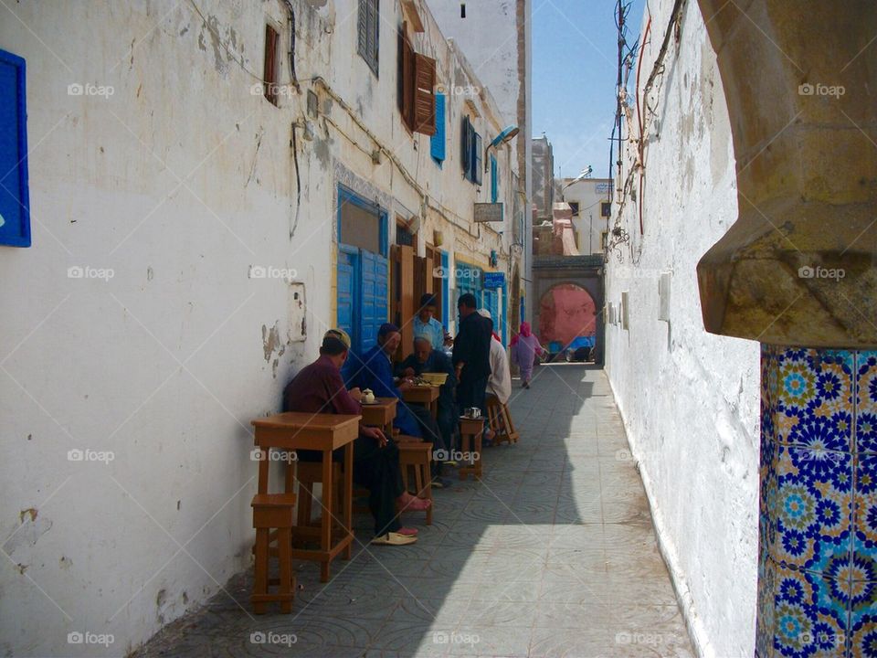 People enjoying food outdoor in  streets of Morocco 