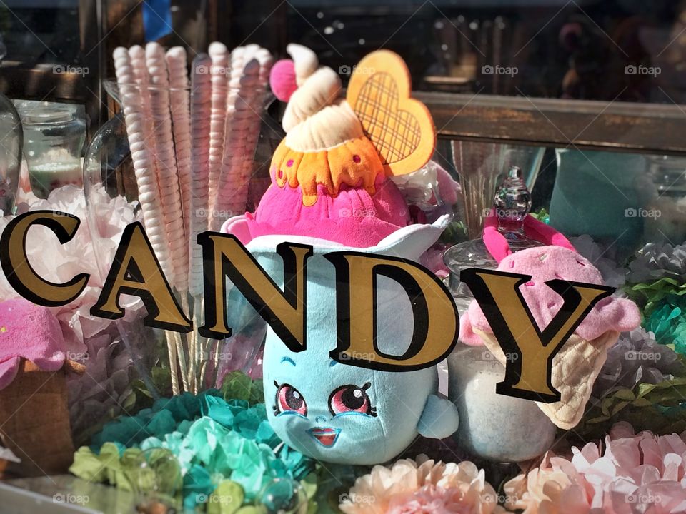 Storefront window display at Eddie sweet shop