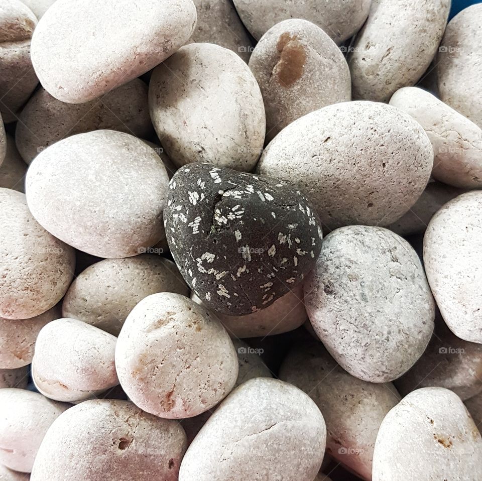 black stone on white ones