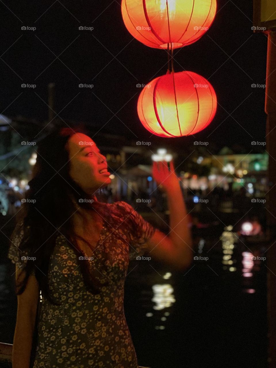 Playing with red lantern (Hoi An Heritage Town, Vietnam)