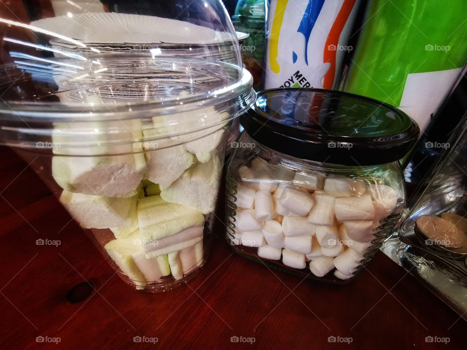 Sweet home indoor food yummy served table day part form circle ellipce tasty mashmellow White yellow