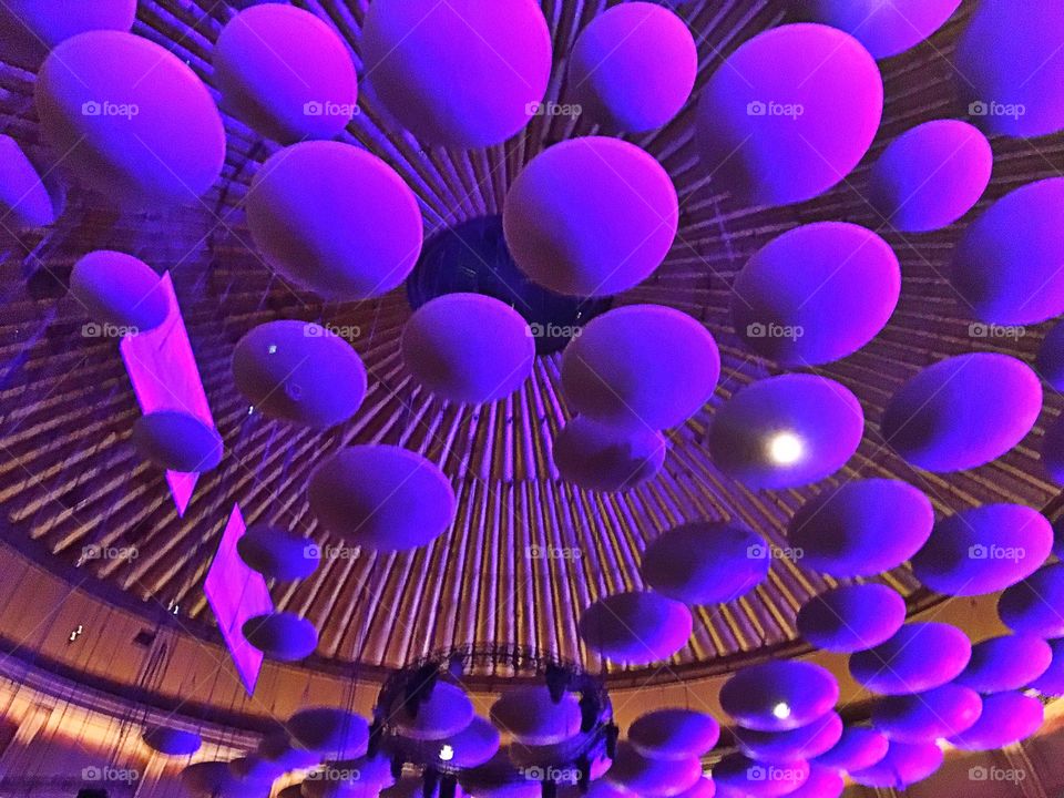 The Royal Albert Hall ceiling all lit up during the proms 