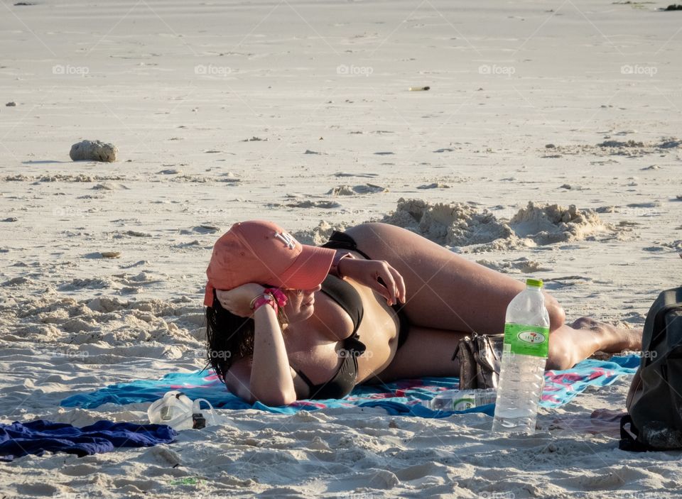 Beautiful woman sunbath on beautiful beach ... koh Lipe Thailand