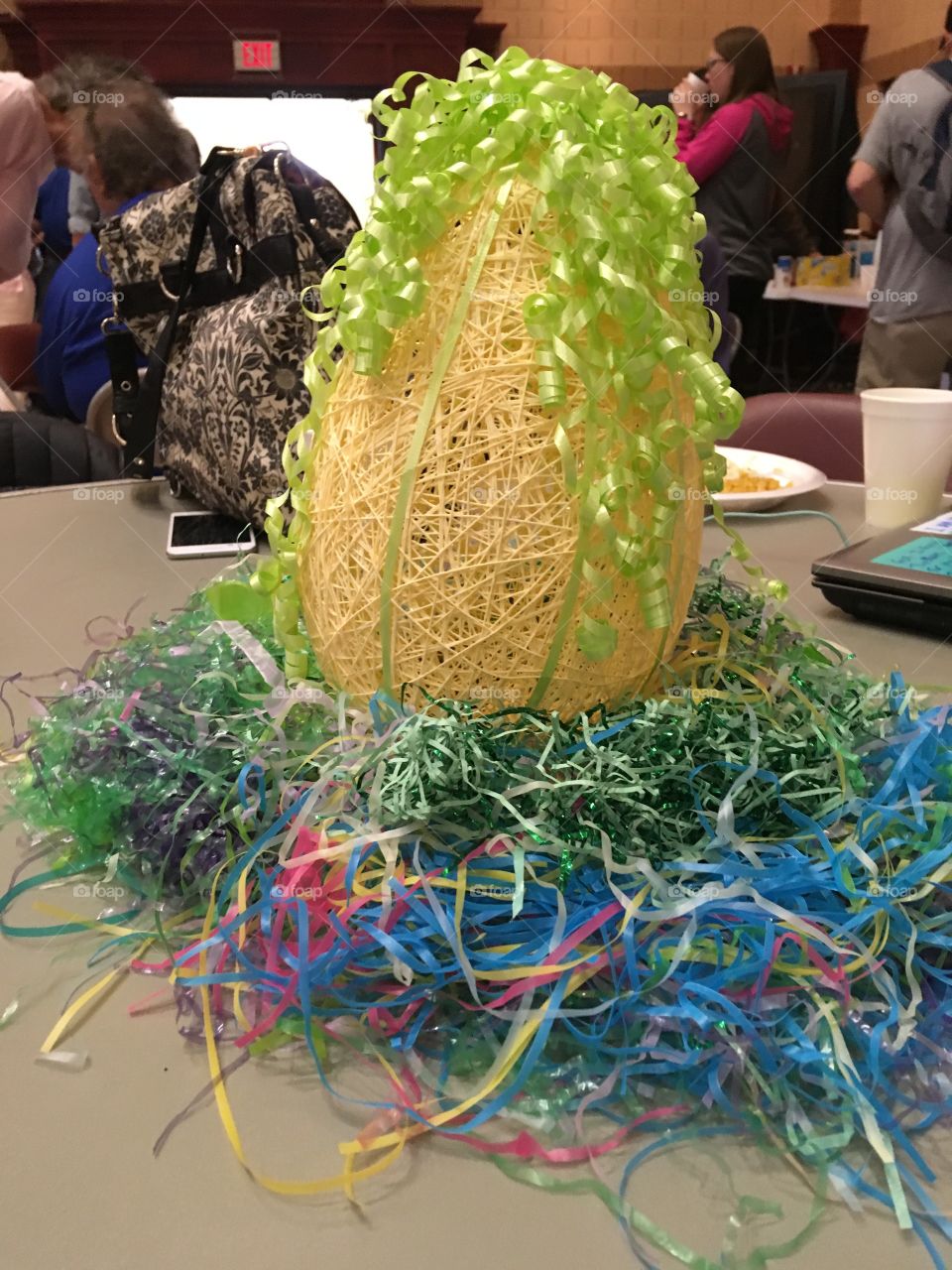 Easter egg center piece green yellow blue red. Home made decorating, good job? On table 