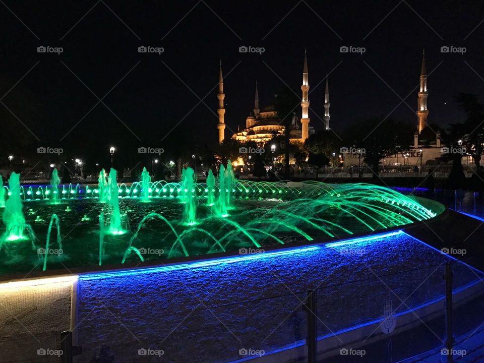 Blue mosque at night green blue