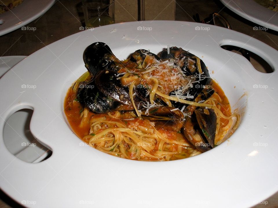 Pasta with mussels in a plate