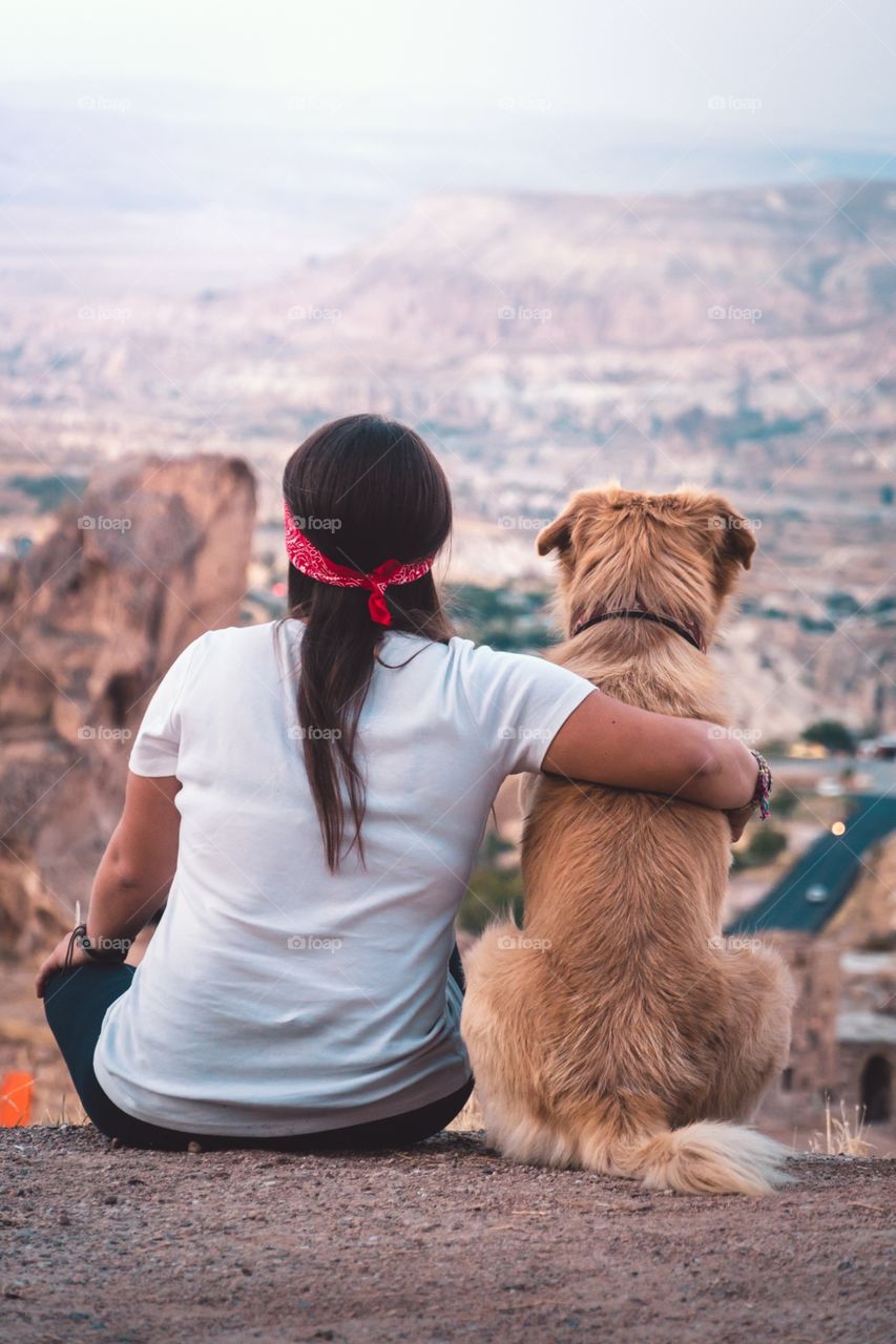 Girl and your friend looking at the view