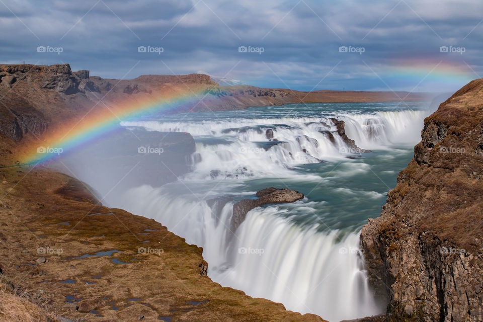 Rainbow over gullfoss waterfall in Iceland 