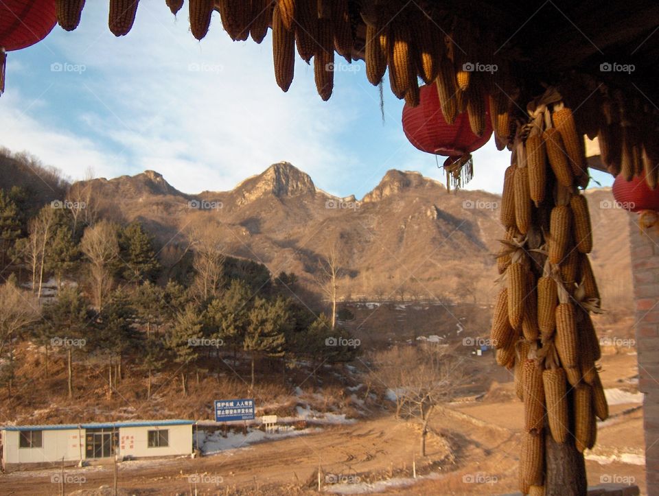 View of unrenovated Great Wall from farmer's home near Beijing China