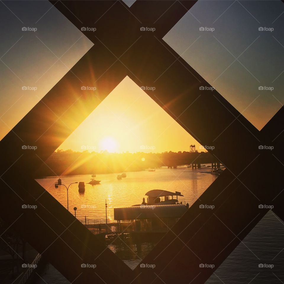 Sunrise from the bridge looking at the boats