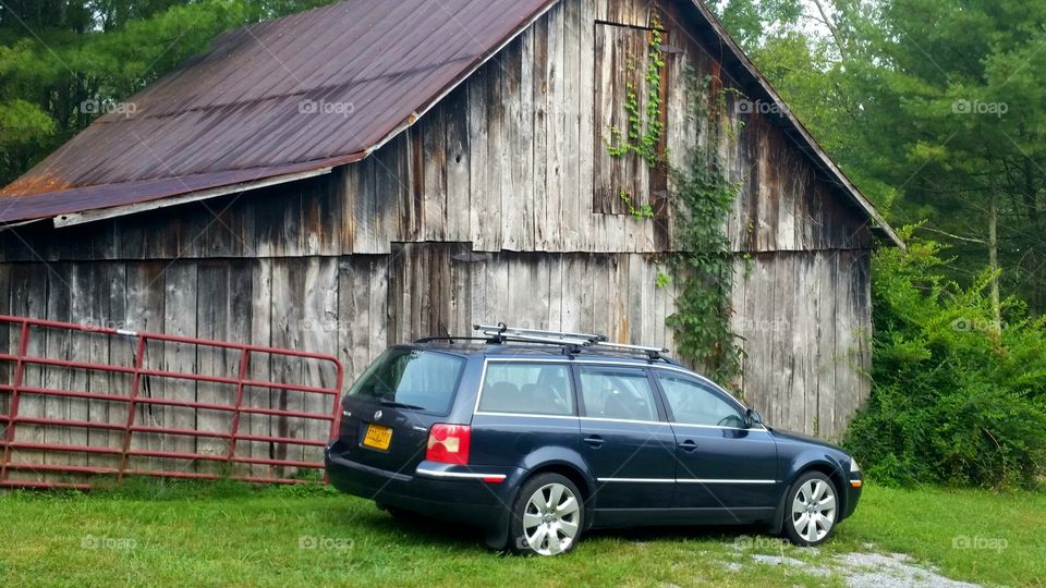 Volkswagen Passat in front of the barn