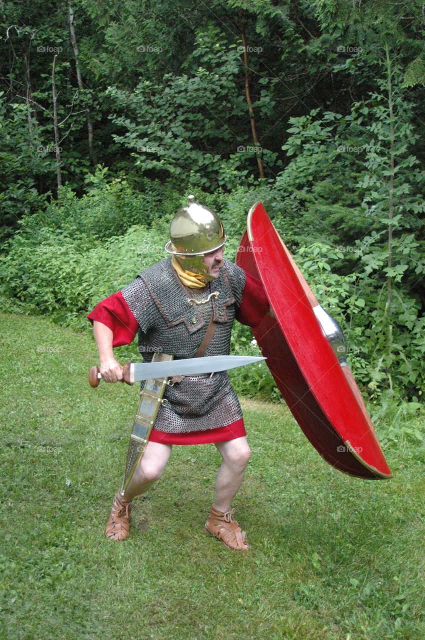 A Republican Roman Soldier portrayed by an historical Reenactor.