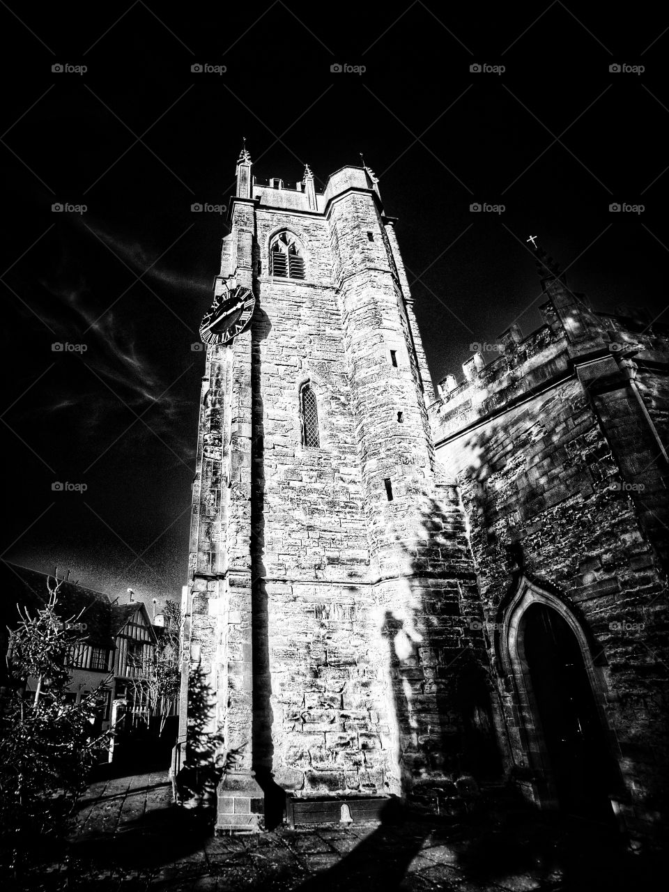 Church - Anglican Church of England traditional village parish church in the English Midlands Warwickshire England uk - edited in high contrast black and white 