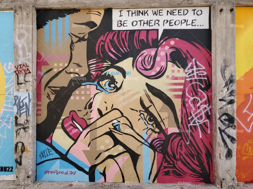 Street art:  Comicbook style woman crying.