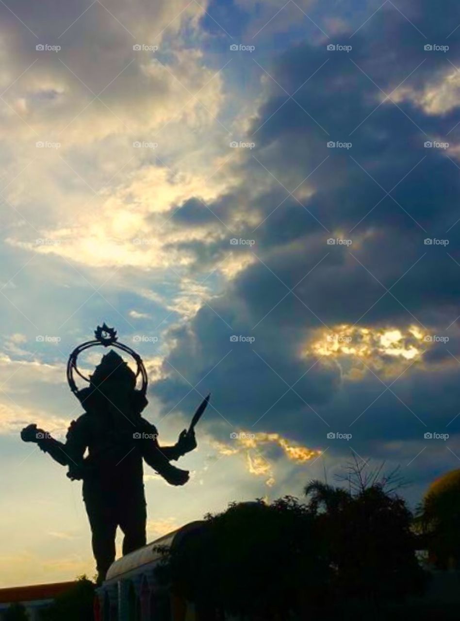 Ganesha Statue with sunset in Thaiand.