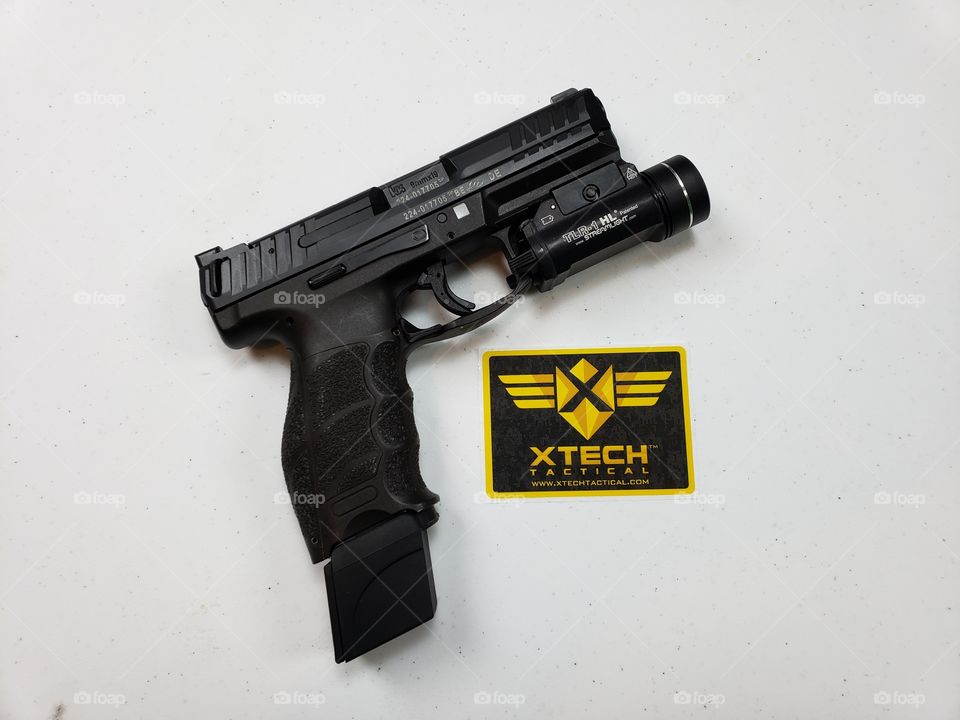 HK VP9 with an XTech extended magazine