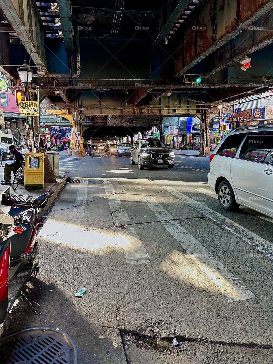 This is the MTA “M” train overpass at the “Myrtle Avenue” station where it intersects with “Broadway” and also “Jefferson Street” in “Bushwick”, Brooklyn. 2024. Hypnotic Productions