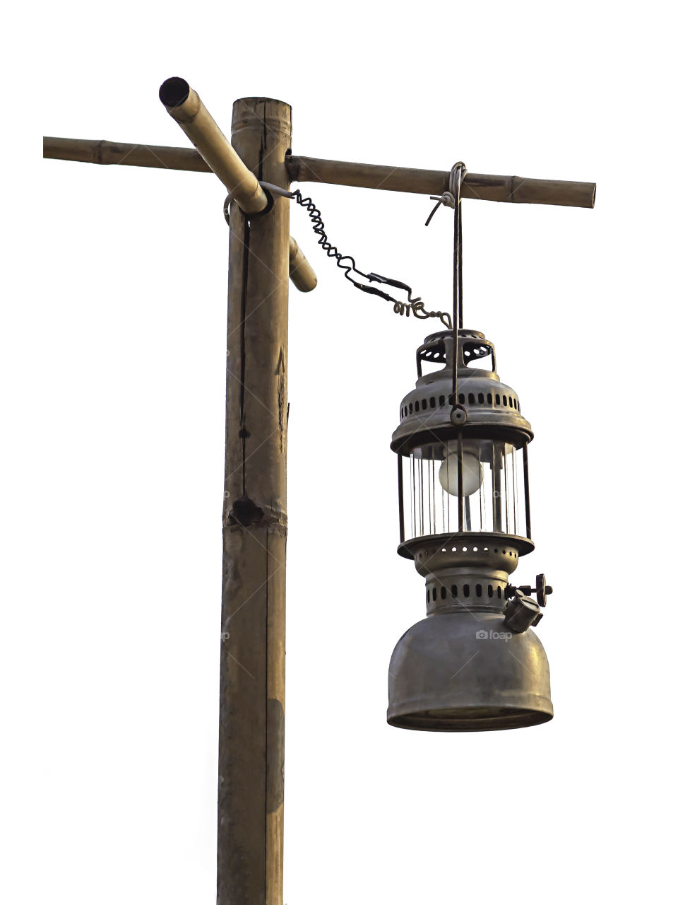 Isolated Old lantern hanging bamboo poles on a white background with clipping path.