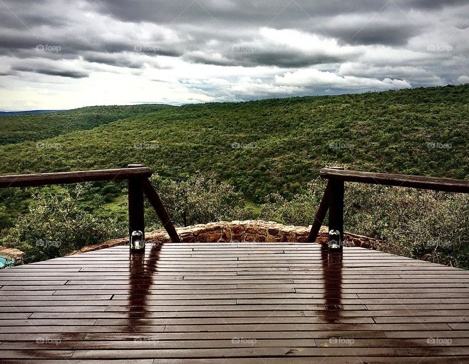 Mountain view from a wooden deck