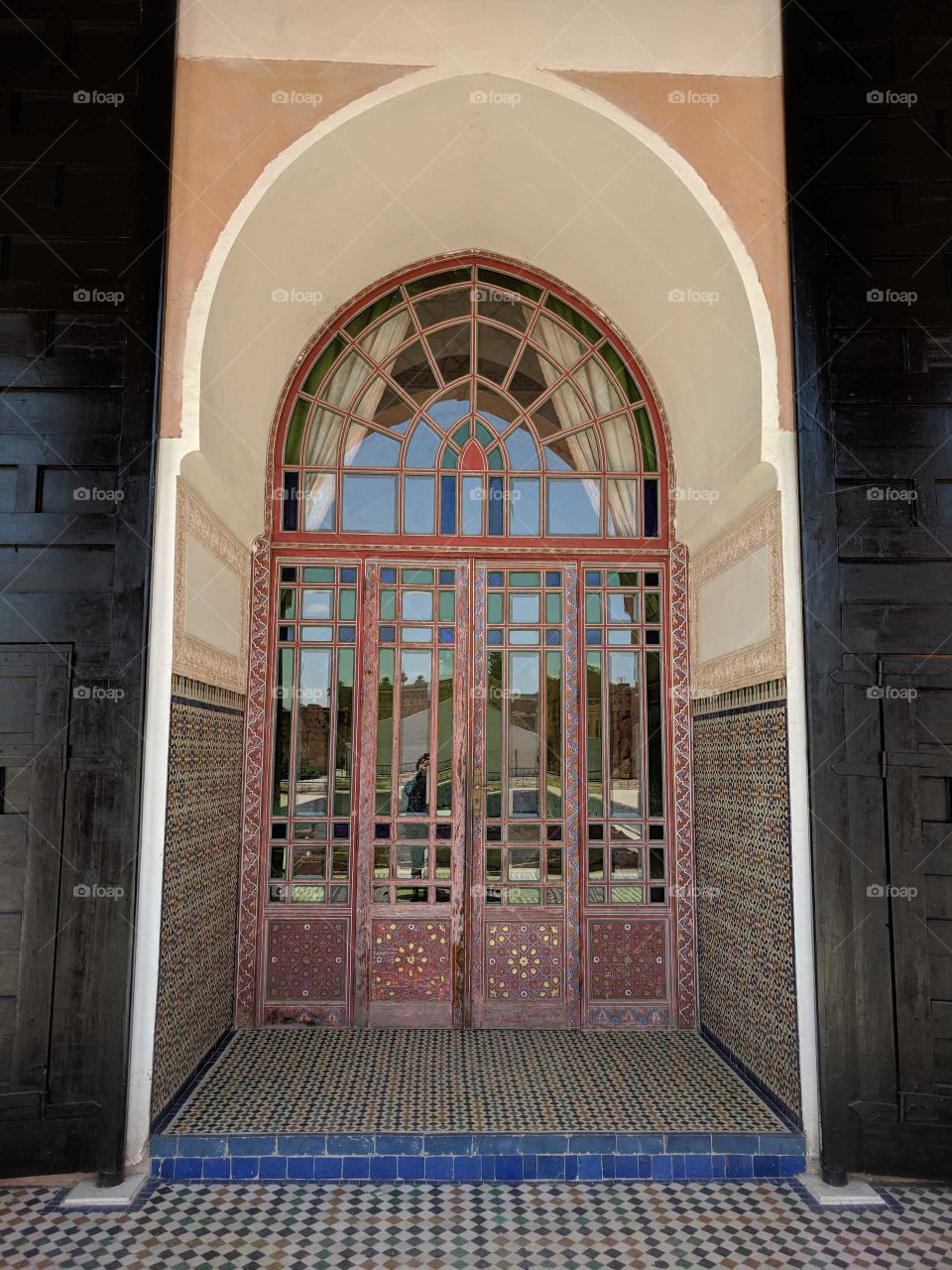 Glass Door and Mosaic Floor at Palais El Badi in Morocco