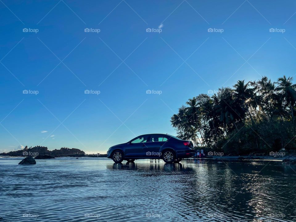 Drive in beach, what a great feeling! Sand, sea and water with trees and rocks around