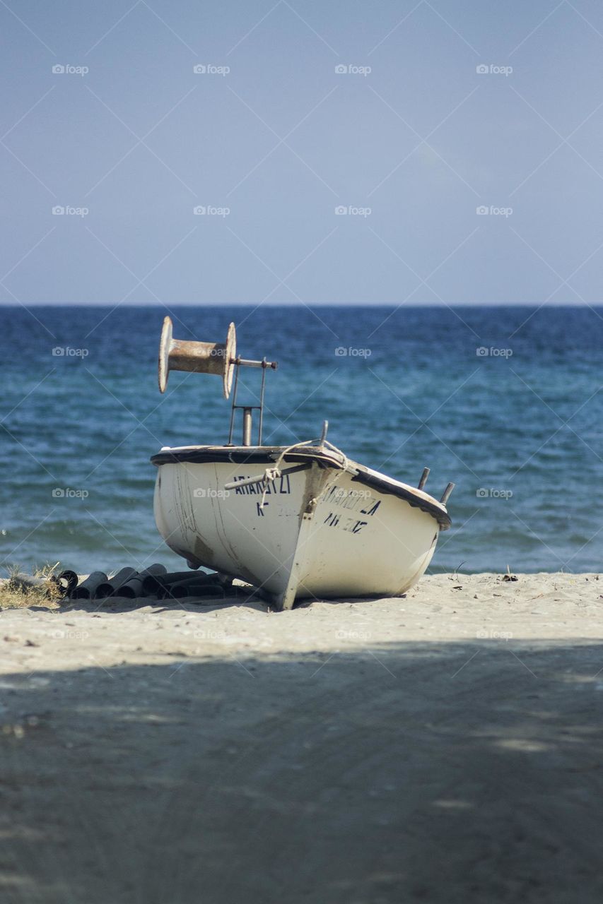 Fishing boat stranded on the beach