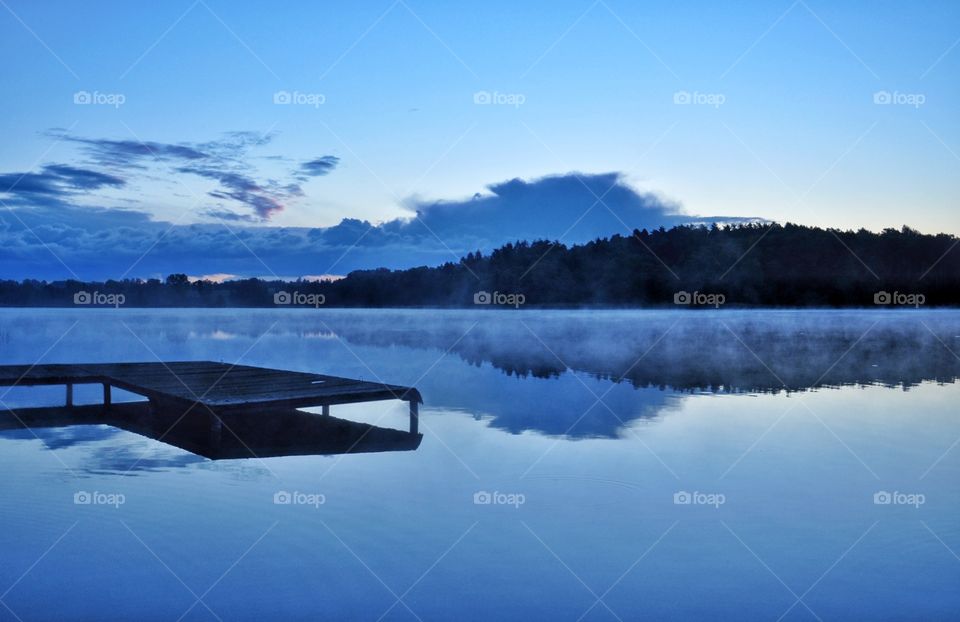 quiet morning at the lake in boreczno, poland