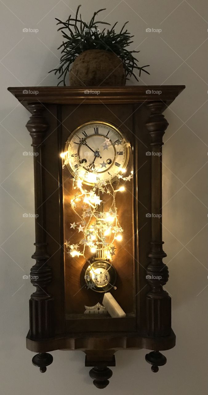 Old clock with christmass decor