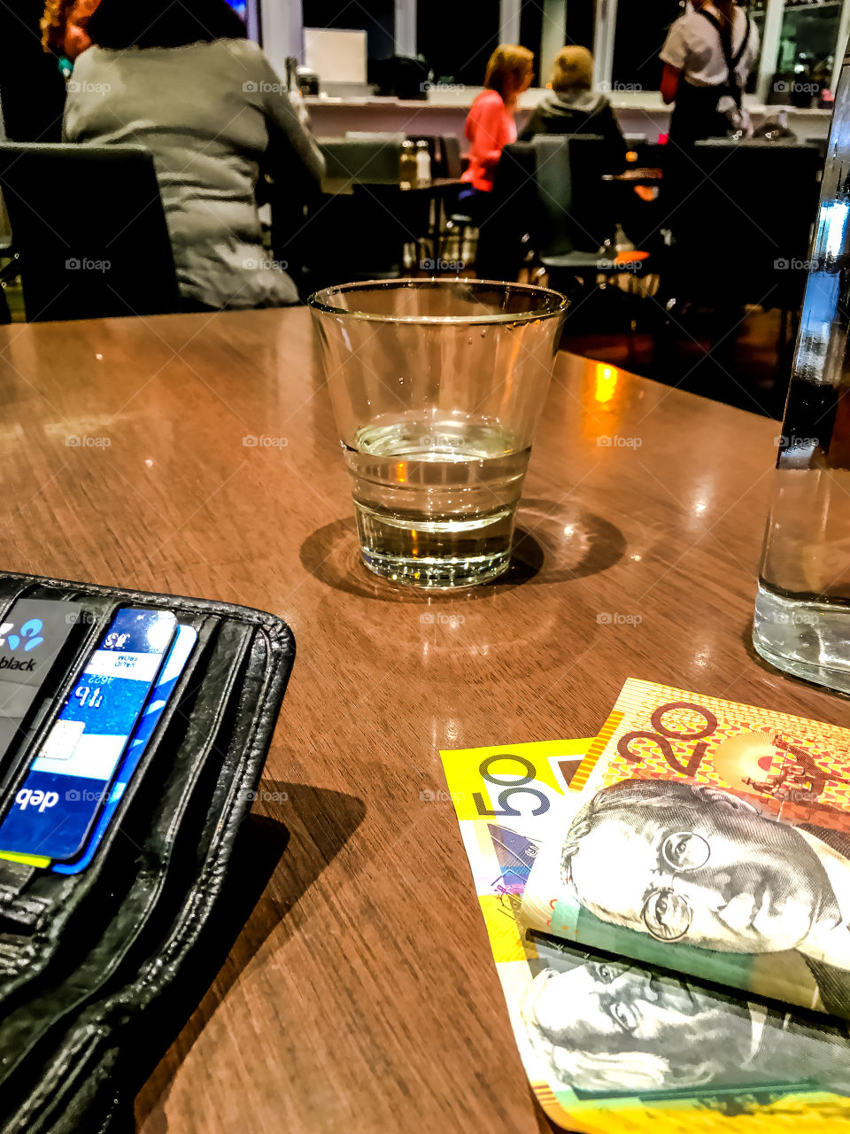 Paying for food at Australian restaurant, wallet, Australian dollars, credit cards, 