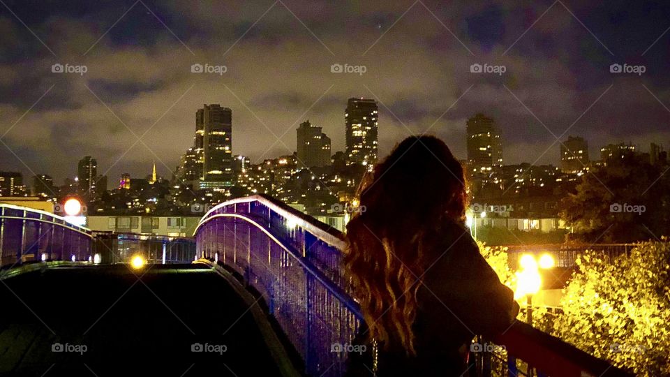 gazing off into the city lights, thankful