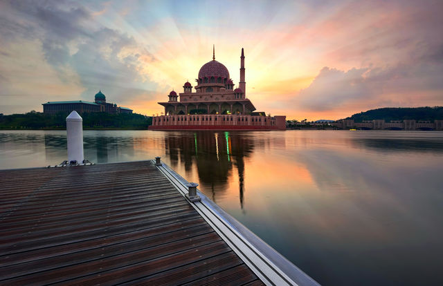 Blessing Sunrise. Sunrise reflections over Putra Mosque Putrajaya, Malaysia